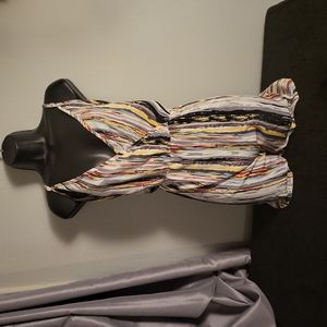 Romper w/adjustable skinny straps.